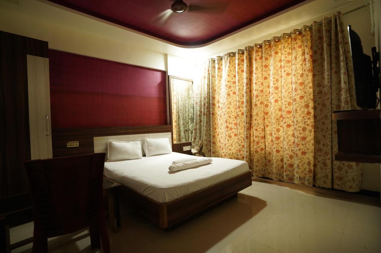 Hotel Sai Ganesh Lodging & Boarding By Wb Inn Titwala Extérieur photo
