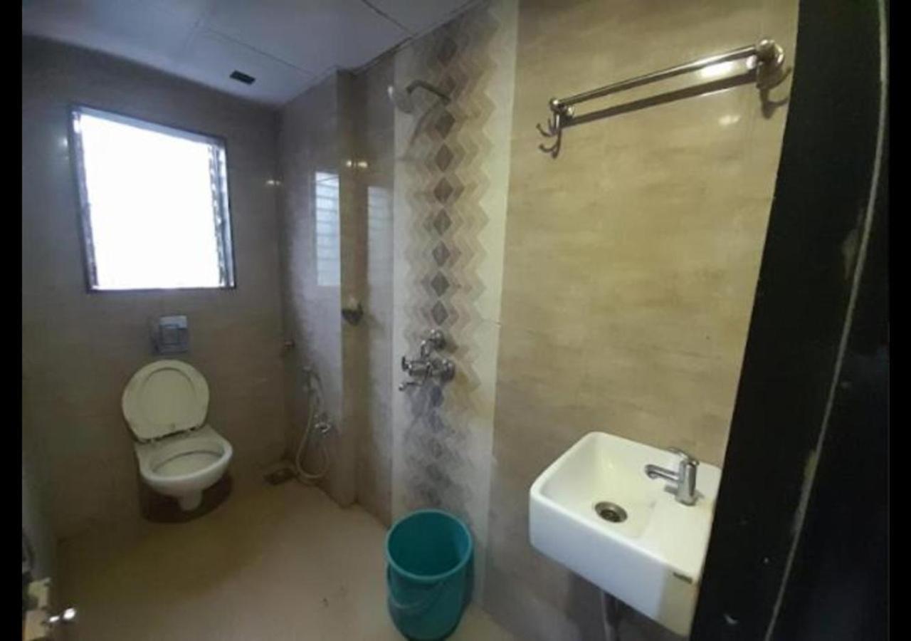 Hotel Sai Ganesh Lodging & Boarding By Wb Inn Titwala Extérieur photo