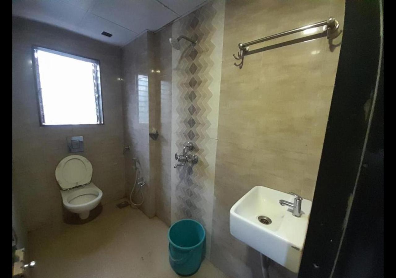 Hotel Sai Ganesh Lodging & Boarding By Wb Inn Titwala Extérieur photo